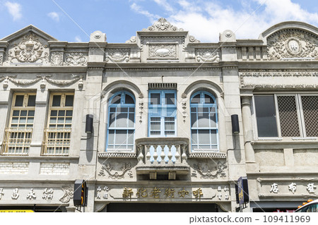 Tainan, Taiwan- June 13, 2022: Building view of Xinhua Old Street in Tainan, Taiwan. which was the Baroque style of buildings during the Japanese rule of Taiwan. Tainan, Taiwan- June 13, 2022: Building view of Xinhua Old Street in Tainan, Taiwan. which was the Baroque style of buildings during the Japanese rule of Taiwan. 109411969