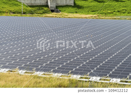 View of the floating Solar power system on the flood detention basin in Kaohsiung, Taiwan. View of the floating Solar power system on the flood detention basin in Kaohsiung, Taiwan. 109412212