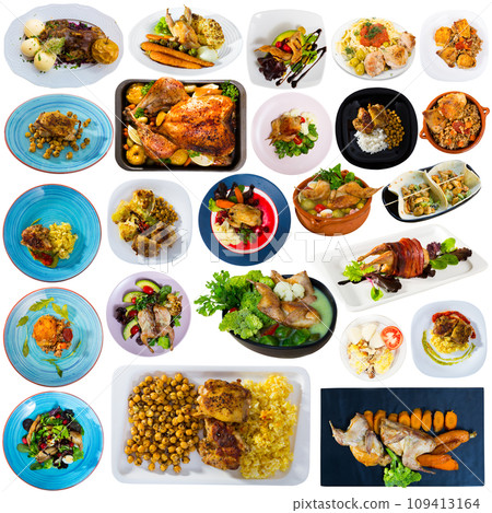 Dishes with cooked fried chicken and baked quail with different vegetables 109413164