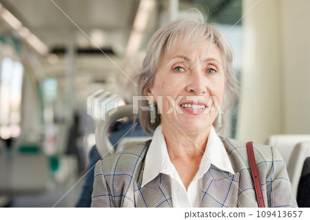 Senior woman in tram 109413657