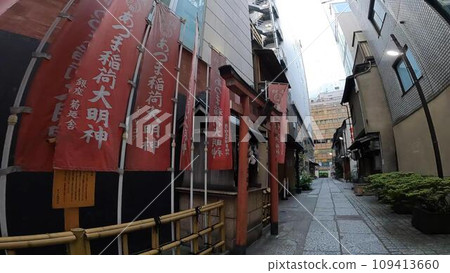 The scenery seen from the back alley. Shrine in the back alley The scenery seen from the back alley. Shrine in the back alley 109413660