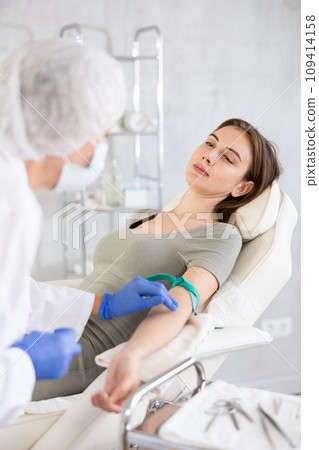 Intravenously injection young patient 109414158