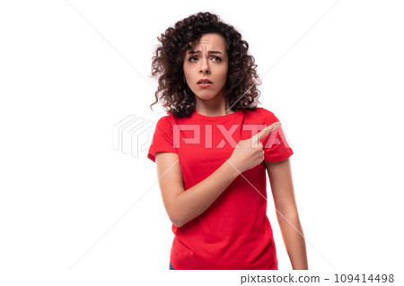 portrait of a 30 year old woman dressed in a red basic t-shirt on a white background with copy space portrait of a 30 year old woman dressed in a red basic t-shirt on a white background with copy space 109414498