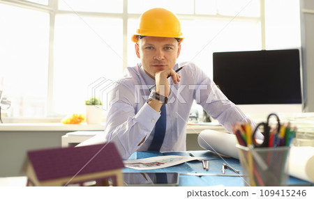 Architect or Engineer Working on Building Plan Architect or Engineer Working on Building Plan 109415246