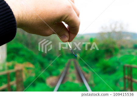 Matches on rails railroad tracks background, fire on railways concept 109415536