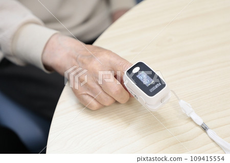 Elderly people having their vitals checked Elderly people having their vitals checked 109415554