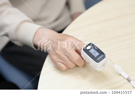 Elderly people having their vitals checked 109415557