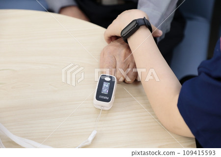Elderly people having their vitals checked Elderly people having their vitals checked 109415593