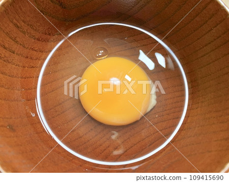 Raw egg in a bowl Raw egg in a bowl 109415690