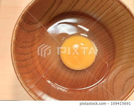 Raw egg in a bowl Raw egg in a bowl 109415691