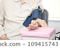 Elderly people having their vitals checked 109415743
