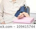 Elderly people having their vitals checked 109415744