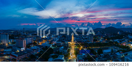 .aerial view beautiful pink cloud in sky at twilight above Phuket city. .aerial view beautiful pink cloud in sky at twilight above Phuket city. 109416216