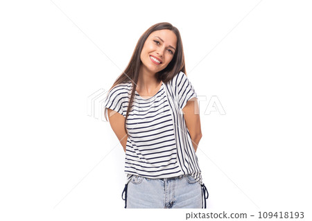 young beautiful caucasian brunette woman in a striped sweater with short sleeves on a white 109418193