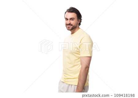 portrait of a handsome young caucasian man with black hair, beard and mustache dressed in a t-shirt 109418198
