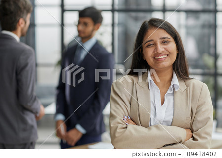 diverse business teammates gather together to share information and plans 109418402