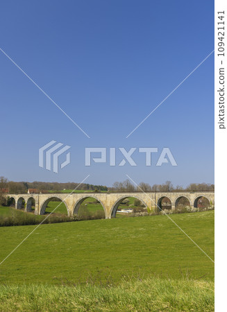 Arched stone railway bridge onabandoned railway near Cognieres, Doubs, France Arched stone railway bridge onabandoned railway near Cognieres, Doubs, France 109421141