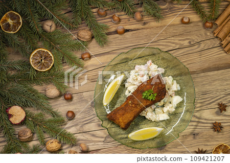 Christmas fried carp with potato salad 109421207