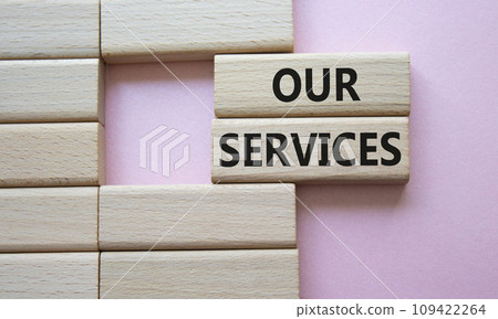 Our services symbol. Concept words Our services on wooden blocks. Beautiful pink background. Business and Our services concept. Copy space. 109422264