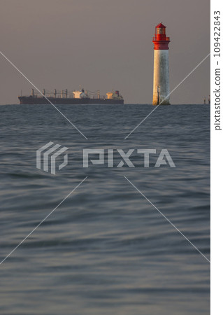 Phare de Chauvea near Ile de Re with ships to La Rochelle, Pays de la Loire, France Phare de Chauvea near Ile de Re with ships to La Rochelle, Pays de la Loire, France 109422843