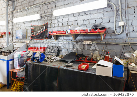 A set of tools in the real auto repair shop. A set of tools in the real auto repair shop. 109422870