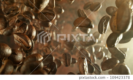Freeze Motion of Falling Roasted Coffee Beans. Freeze Motion of Falling Roasted Coffee Beans. 109423378