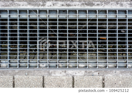 Metal grate on drainage. 109425212