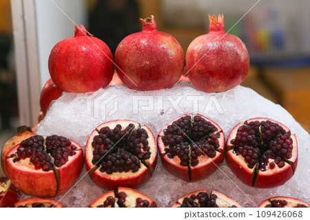 Get a close-up view of pomegranates ready to be juiced in Ho Chi Minh City Get a close-up view of pomegranates ready to be juiced in Ho Chi Minh City 109426068