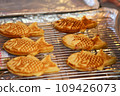 Closeup of Taiyaki Grilled Fish Cake with Cheese Filling in the food festival 109426073