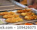 Closeup of Taiyaki Grilled Fish Cake with Cheese Filling, Japan 109426075