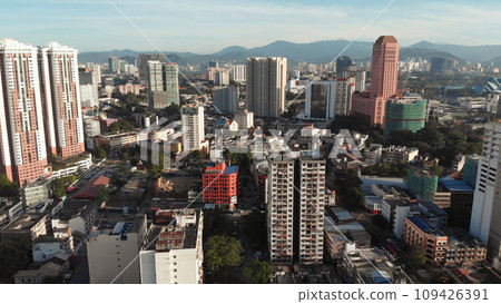 Aerial view of the silhouette of skyscrapers and the city center of Kuala Lumpur. Aerial view of the silhouette of skyscrapers and the city center of Kuala Lumpur. 109426391