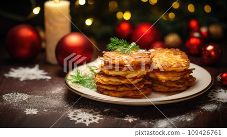 Latkes on the holiday table, a flavorful addition for Christmas festivities, a crispy 109426761