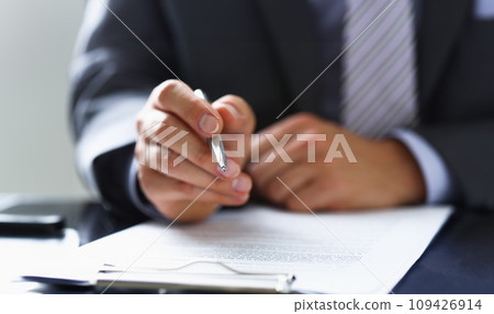 Male arm in suit and tie fill form clipped 109426914