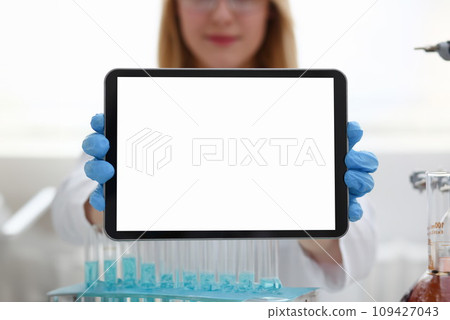A female doctor in a chemical laboratory holds A female doctor in a chemical laboratory holds 109427043