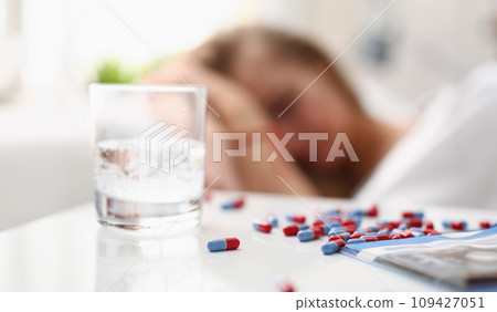 woman is ill take drugs sleep in bed woman is ill take drugs sleep in bed 109427051