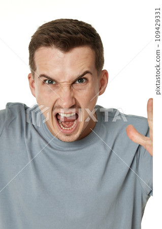 annoyed angry bearded man shouting on white studio background annoyed angry bearded man shouting on white studio background 109429331