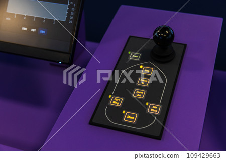 Fragment of illuminated ship control panel on the captain bridge. External CCTV control 109429663