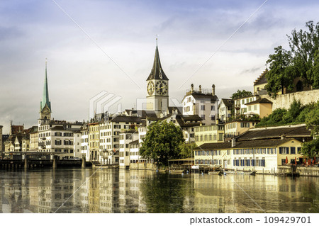 Scenic view of historic Zurich city center with famous Fraumunster and river Limmat at Lake Zurich,Switzerland 109429701