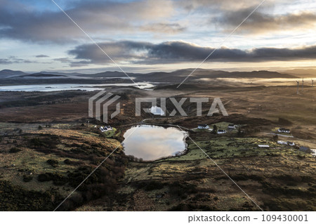 Aerial view of a foggy Bonny Glen by Portnoo in County Donegal - Ireland Aerial view of a foggy Bonny Glen by Portnoo in County Donegal - Ireland 109430001