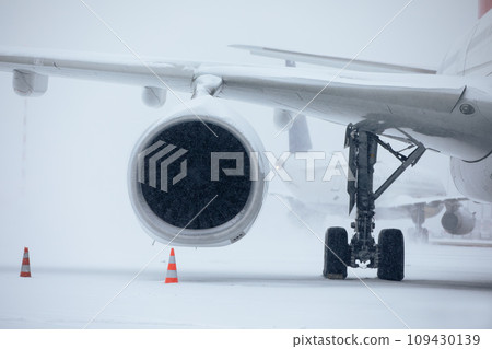 Traffic at airport during heavy snowfall. Traffic at airport during heavy snowfall. 109430139