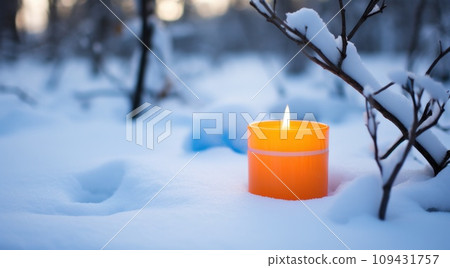 a lit candle in the snow near an oak tree, a lit candle in the snow near an oak tree, 109431757