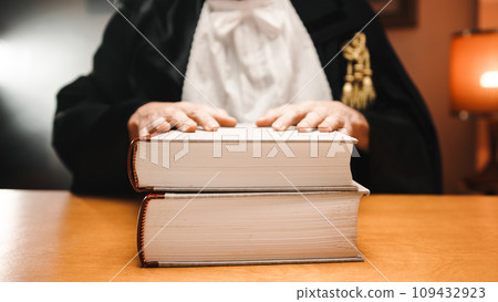 Judge with hands On The books 109432923