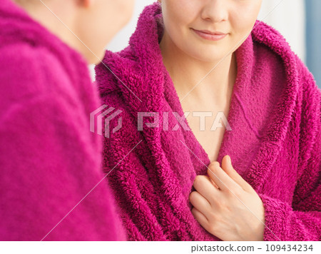 Woman in towel after shower Woman in towel after shower 109434234