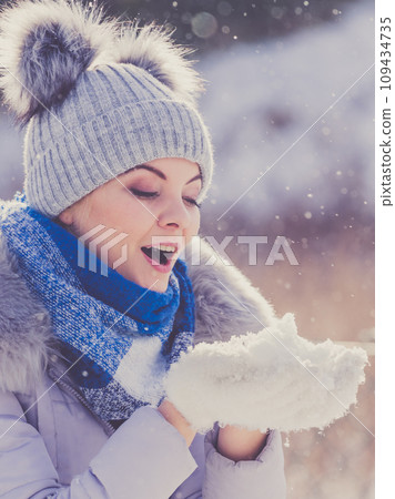 Female wearing warm outfit during winter Female wearing warm outfit during winter 109434735