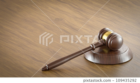 Gavel Resting on a Table with Room For Text. 109435292