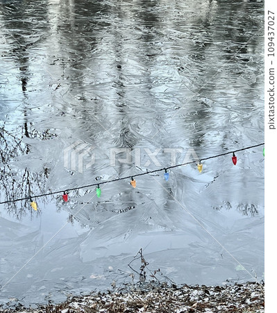 A frozen pond I saw on a cold winter walking path 109437027