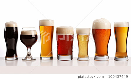 Different beers in glasses with foamy tops and condensation. 109437449