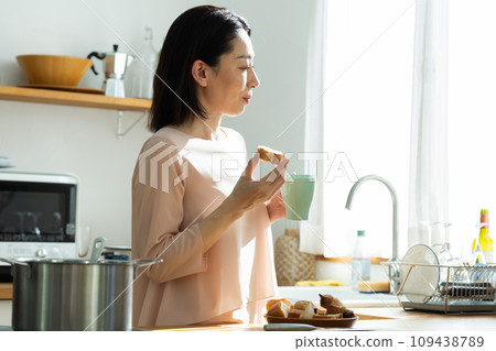 A beautiful woman enjoying a refreshing morning A beautiful woman enjoying a refreshing morning 109438789
