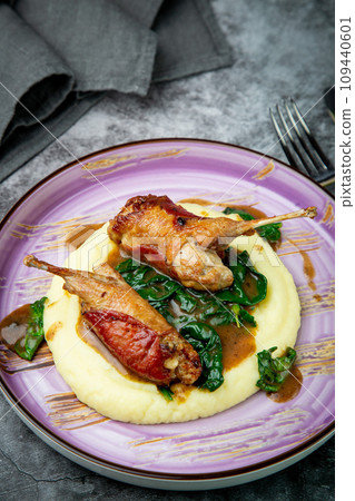 baked chicken wings with gravy, spinach and mashed potatoes top view baked chicken wings with gravy, spinach and mashed potatoes top view 109440601