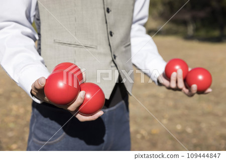 Image of male hands juggling 109444847